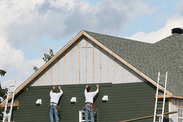 Professional Siding Repair technician working in Yukon, PA